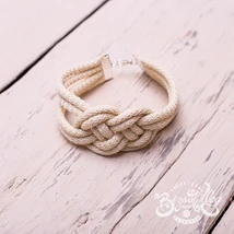 Krémszínű, matt csomózott karkötő